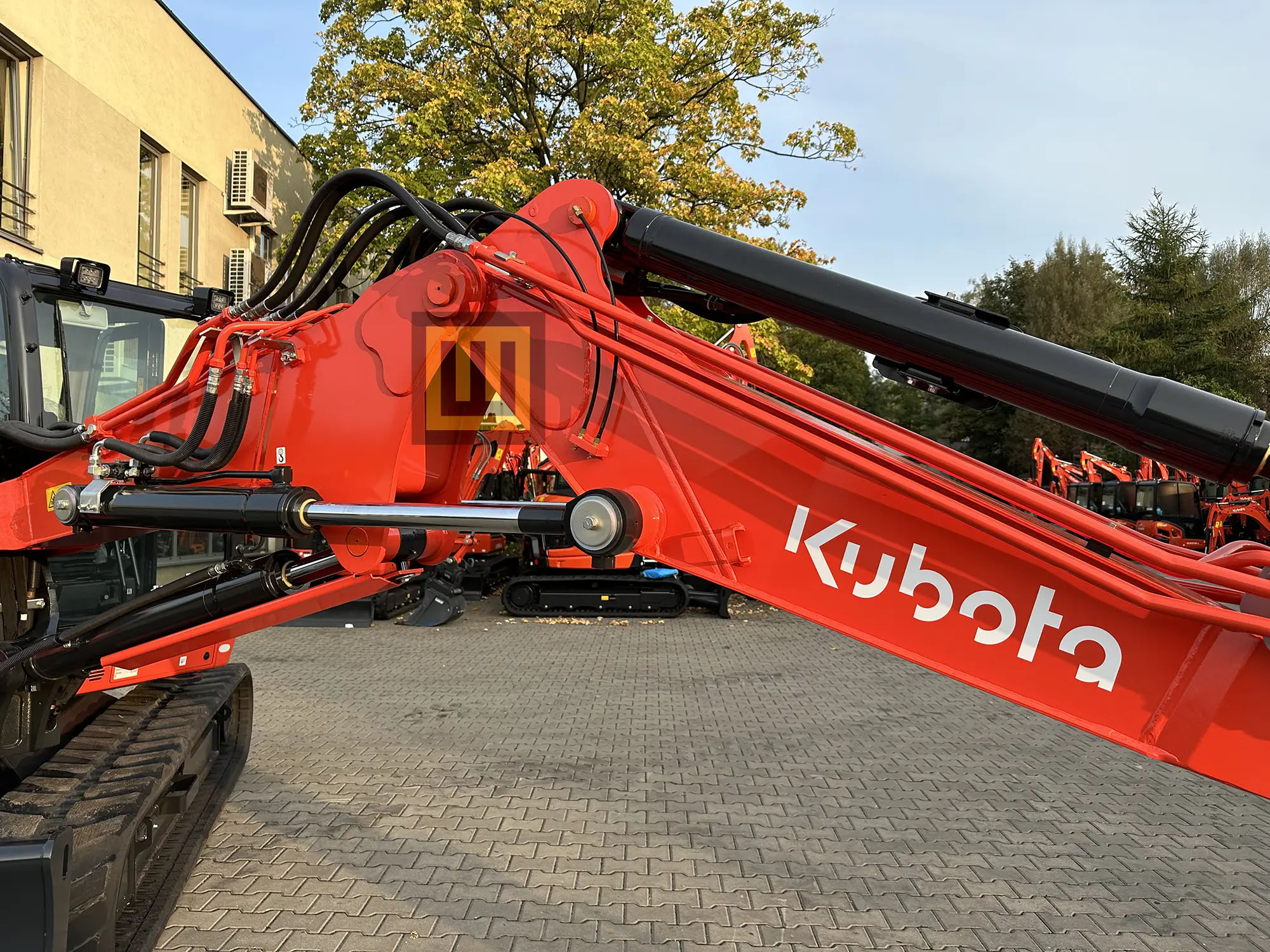 Dwuczęściowy wysięgnik (2-Piece boom) w KX085-5 2PGL